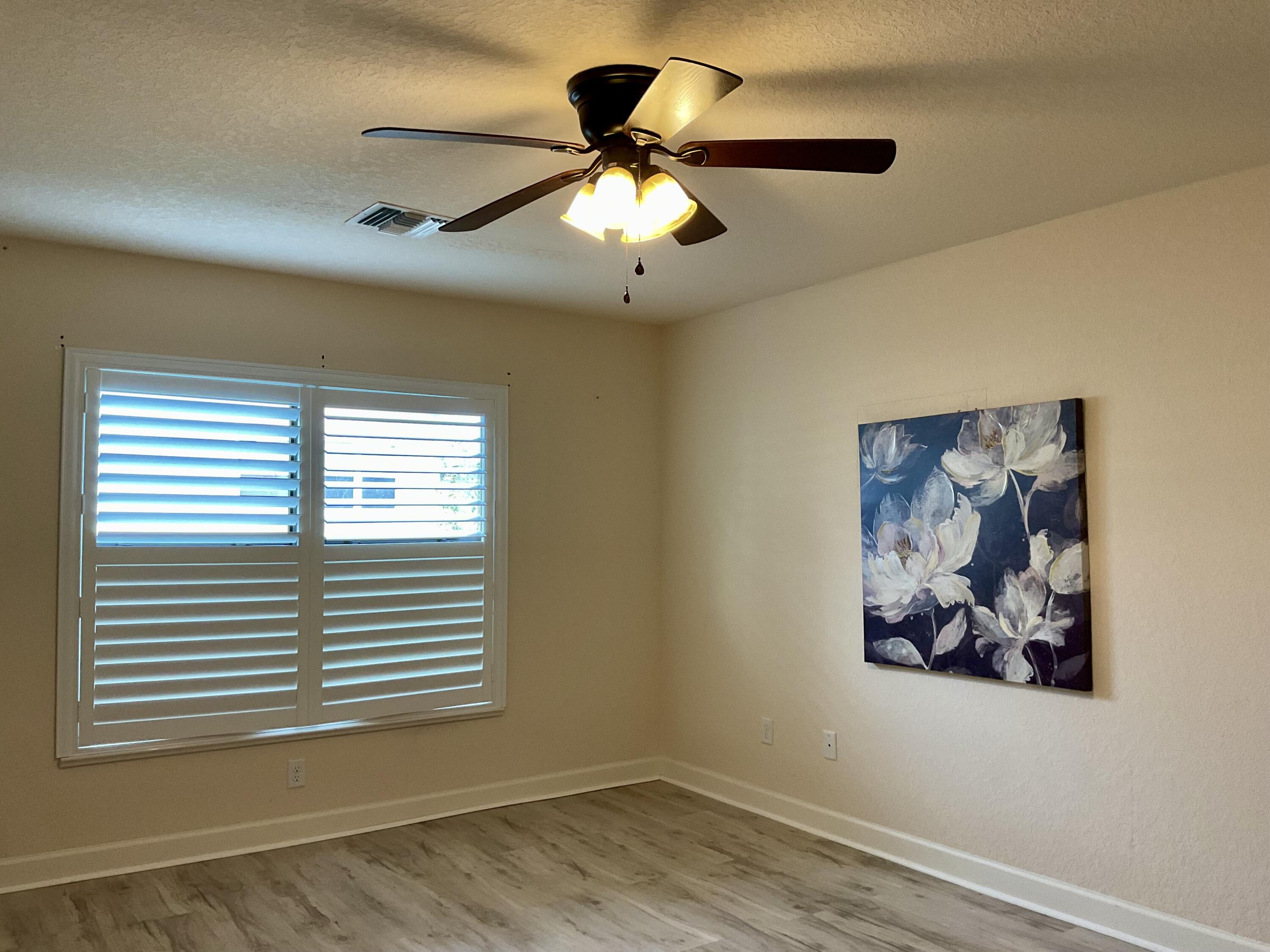 2 Southeast Antigua Lane Port St. Lucie, FL 34952 - Photo 8 of 22 Master bedroom