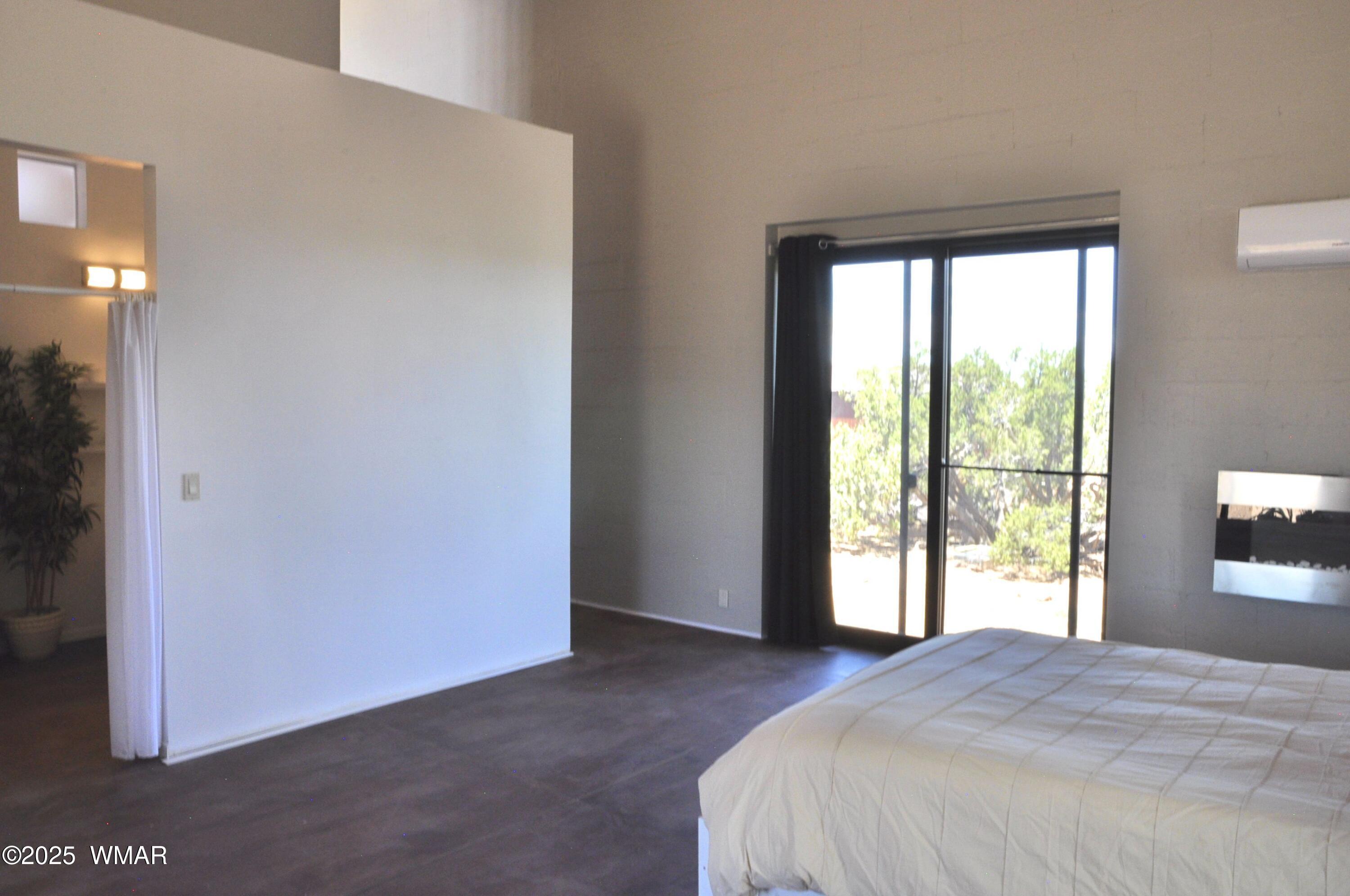 12 County Road Concho, AZ 85924 - Photo 16 of 85 Spacious Master Bedrm w Adjoining Master Bath, Outdoor Patio Door, Non-Toxic Plaster Walls