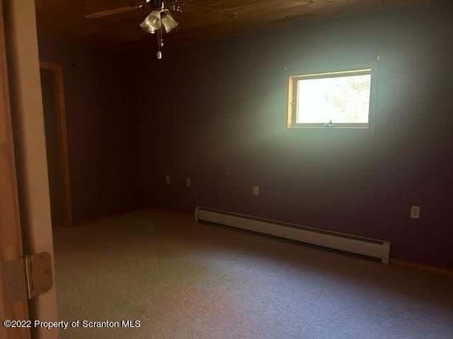 1271 Rummerfield Creek Road Wyalusing, PA 18853 - Photo 3 of 16 a view of room with a ceiling fan and window