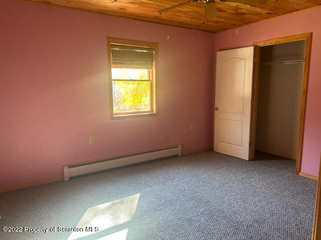 1271 Rummerfield Creek Road Wyalusing, PA 18853 - Photo 5 of 16 a view of an empty room with a window