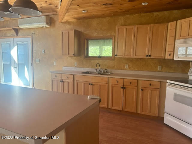 1271 Rummerfield Creek Road Wyalusing, PA 18853 - Photo 7 of 16 a kitchen with cabinets and window