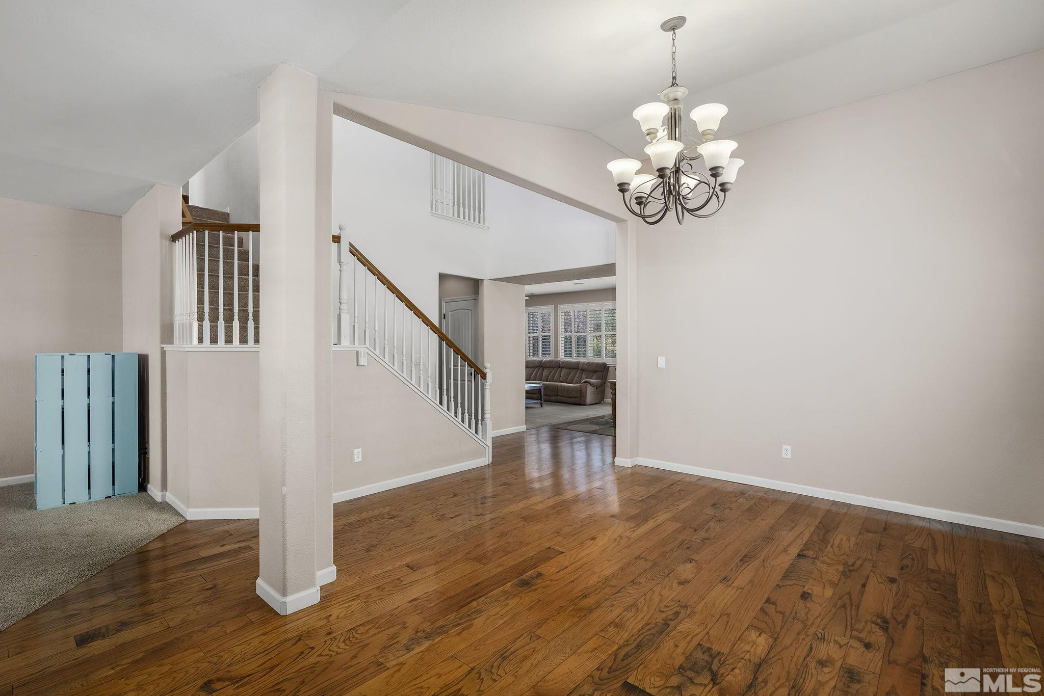 10537 Fort Morgan Way Reno, NV 89521 - Photo 4 of 30 a view of an entryway with wooden floor