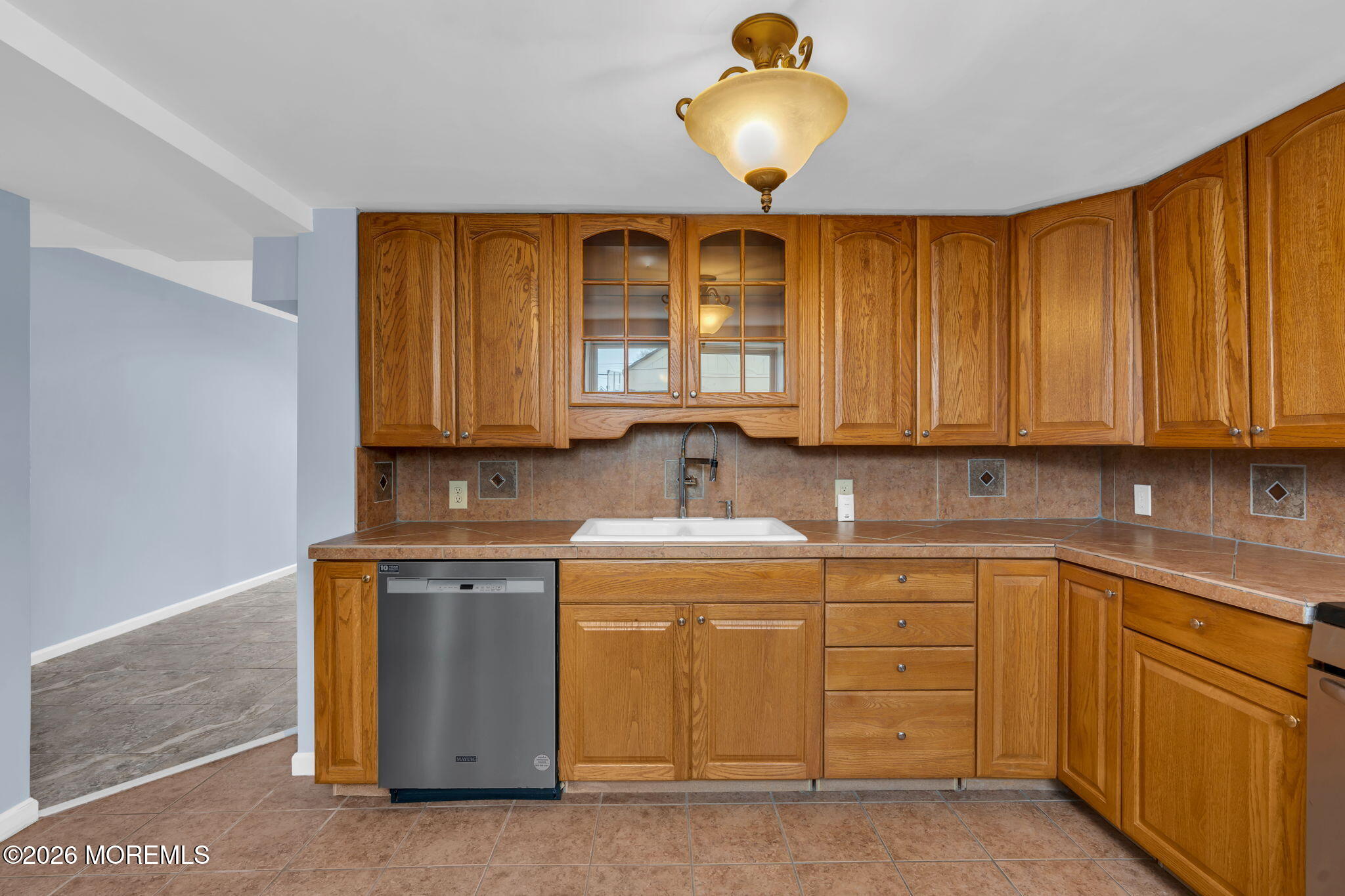 1208 Pine Tree Way, Unit BACK HOUSE Belmar, NJ 07719 - Photo 11 of 24 a kitchen with sink cabinets and window