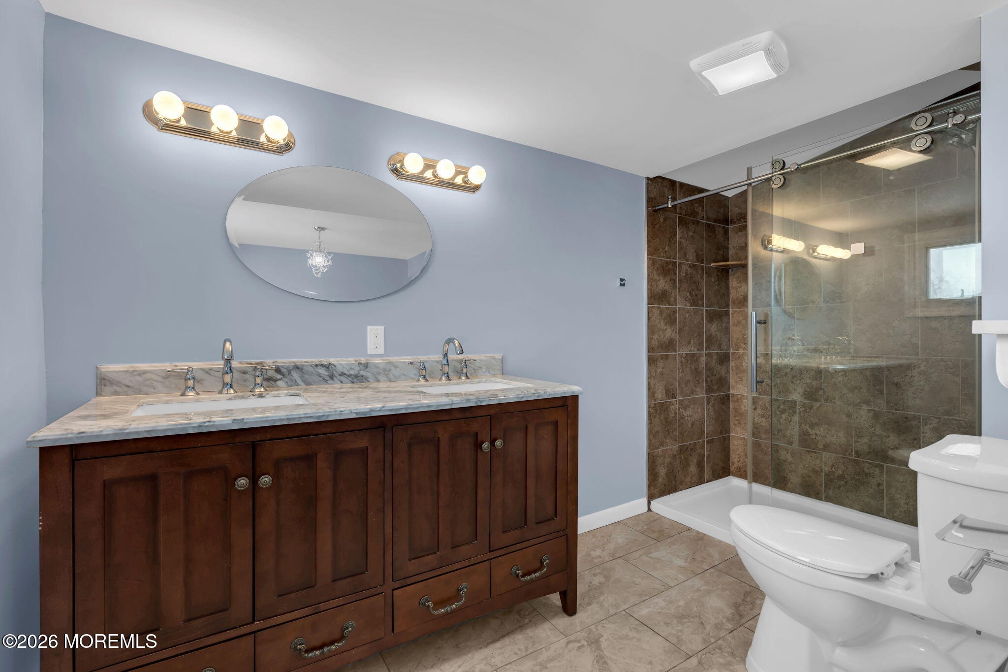 1208 Pine Tree Way, Unit BACK HOUSE Belmar, NJ 07719 - Photo 16 of 24 a bathroom with a sink and a mirror