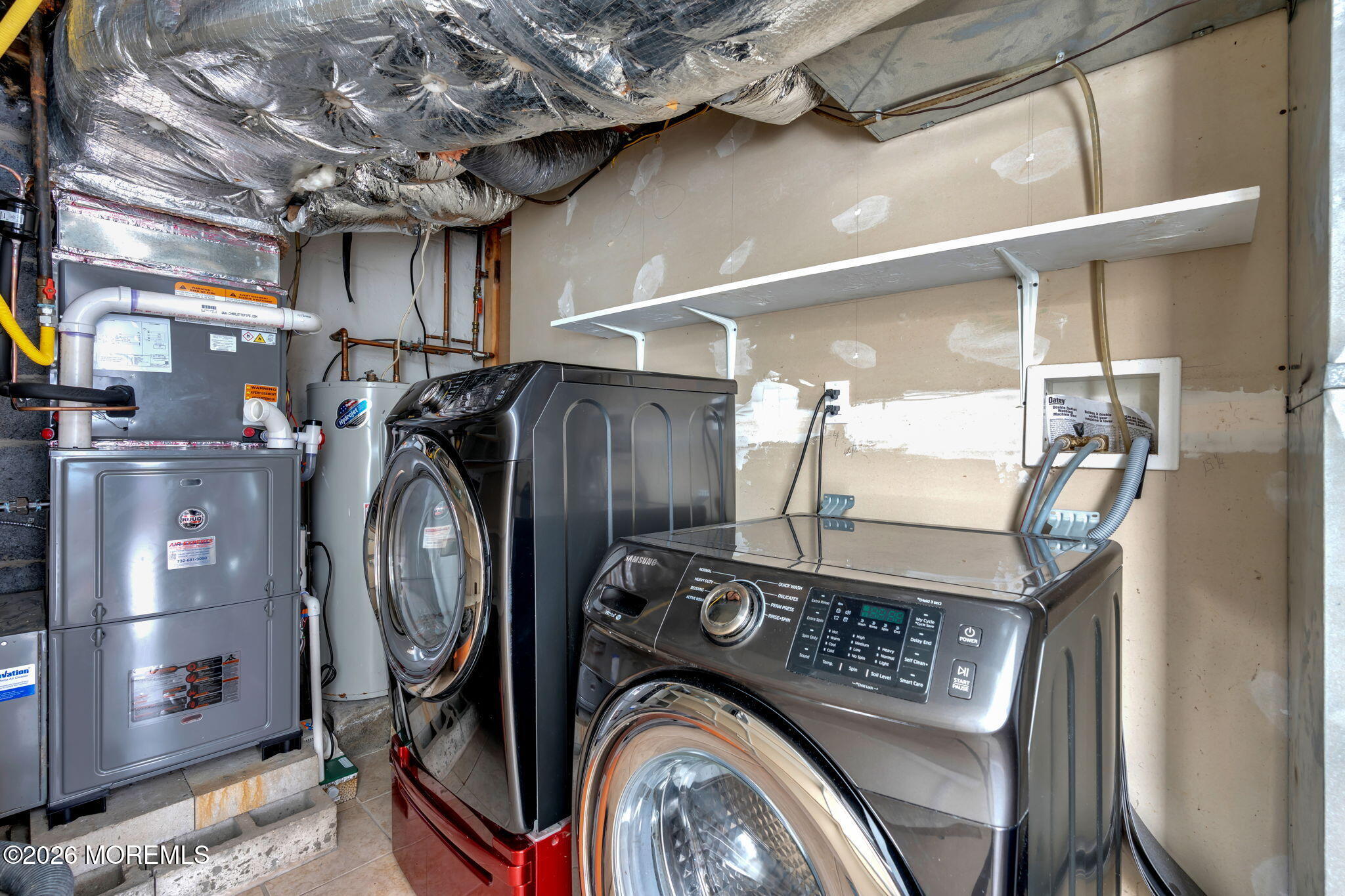 1208 Pine Tree Way, Unit BACK HOUSE Belmar, NJ 07719 - Photo 21 of 24 a view of walk in closet with clothes and shoes