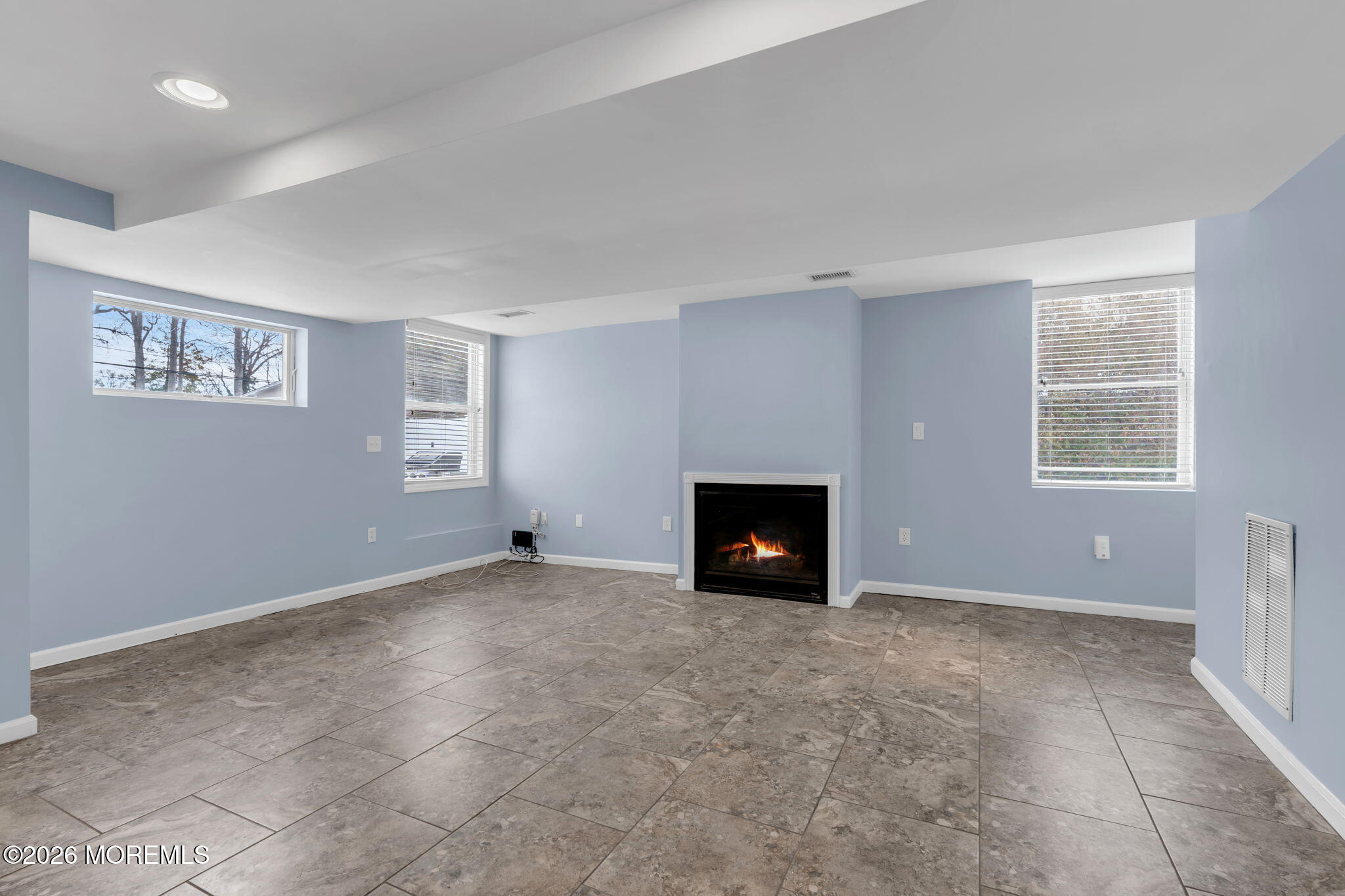 1208 Pine Tree Way, Unit BACK HOUSE Belmar, NJ 07719 - Photo 6 of 24 a view of an empty room with a window