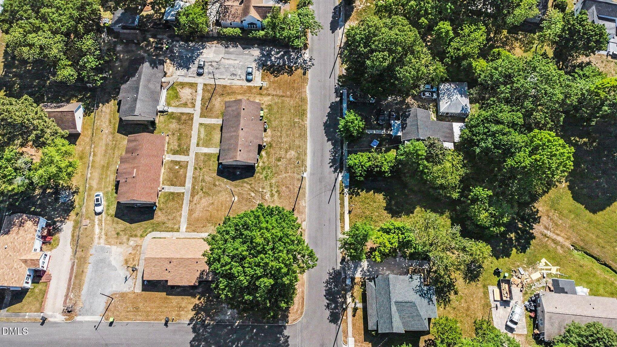 315 Cook Street Wendell, NC 27591 - Photo 7 of 22 an aerial view of residential houses with outdoor space