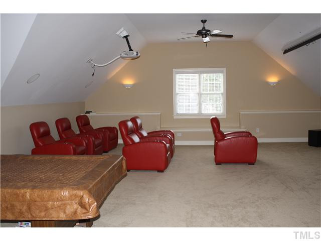7221 Sparhawk Road Wake Forest, NC 27587 - Photo 23 of 25 Theater Chairs, Projector and Screen convey Media Room