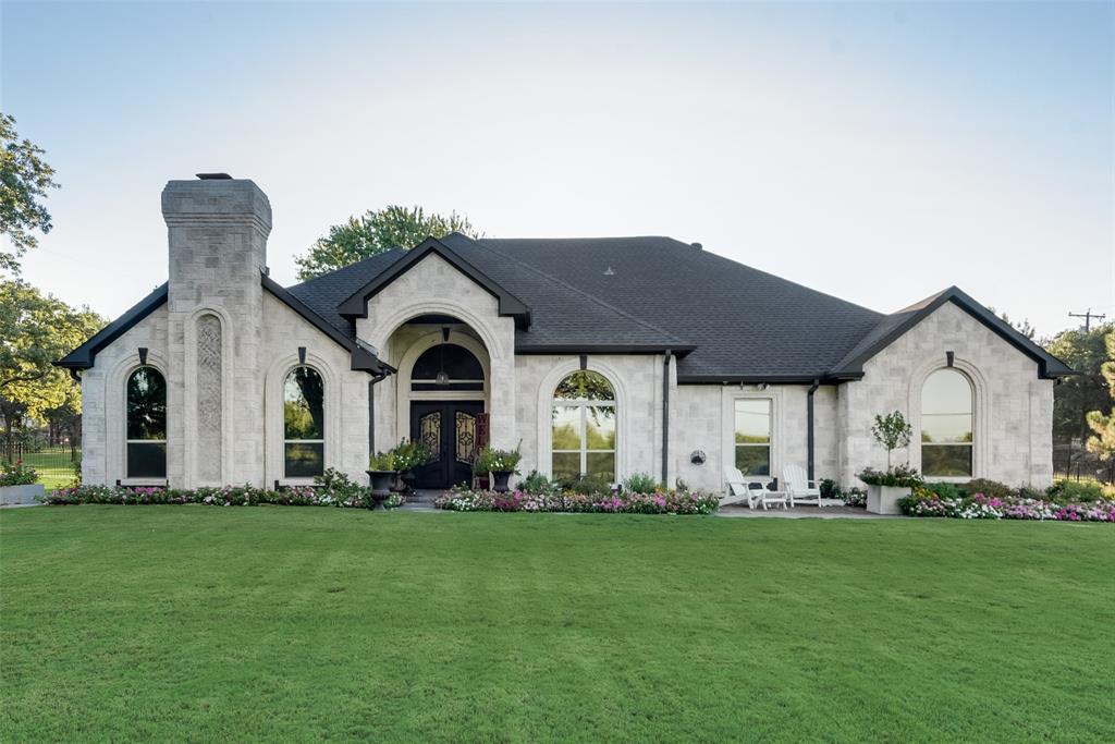 3000 High Road Flower Mound, TX 75022 - Photo 1 of 1 a front view of house with yard and green space