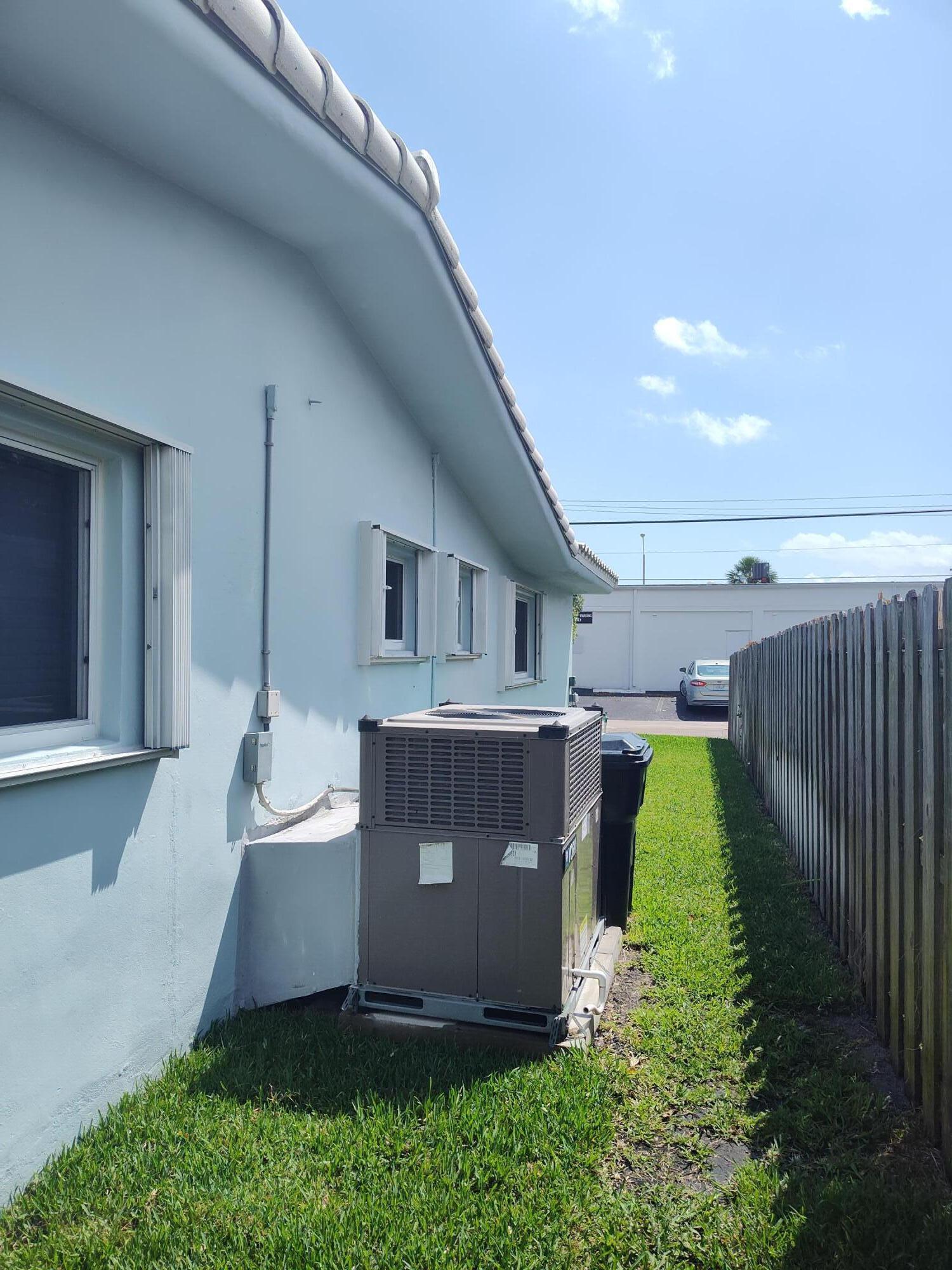 2248 Northeast 37th Street Lighthouse Point, FL 33064 - Photo 18 of 19 a view of house with backyard