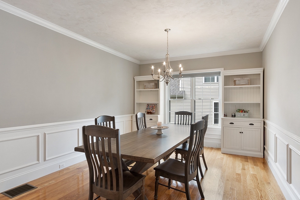 46 Jordan Road Holden, MA 01520 - Photo 12 of 42 a view of a dining room with furniture window and wooden floor