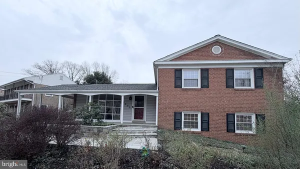 a front view of a house with yard