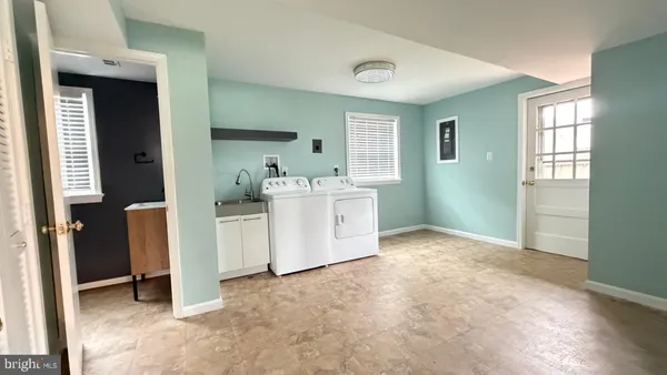 a view of a room with closet and windows