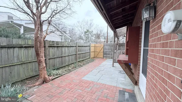 a brick house with a large door