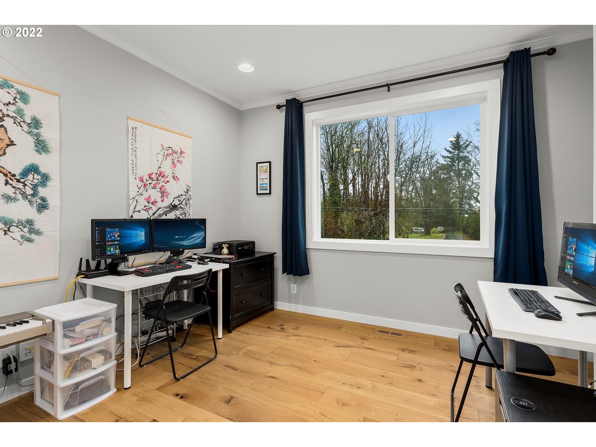 10 Southwest Palatine Hill Road Portland, OR 97219 - Photo 9 of 22 a workspace with furniture and a large window