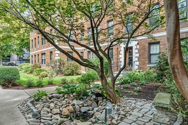 a house with trees in front of it