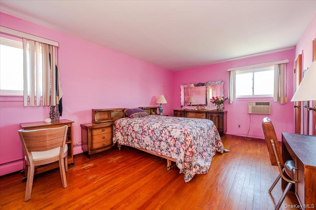 10 Meadow Road Inwood, NY 11096 - Photo 13 of 22 Bedroom featuring wood-type flooring