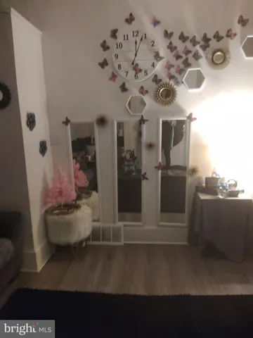 a view of a room with a large window