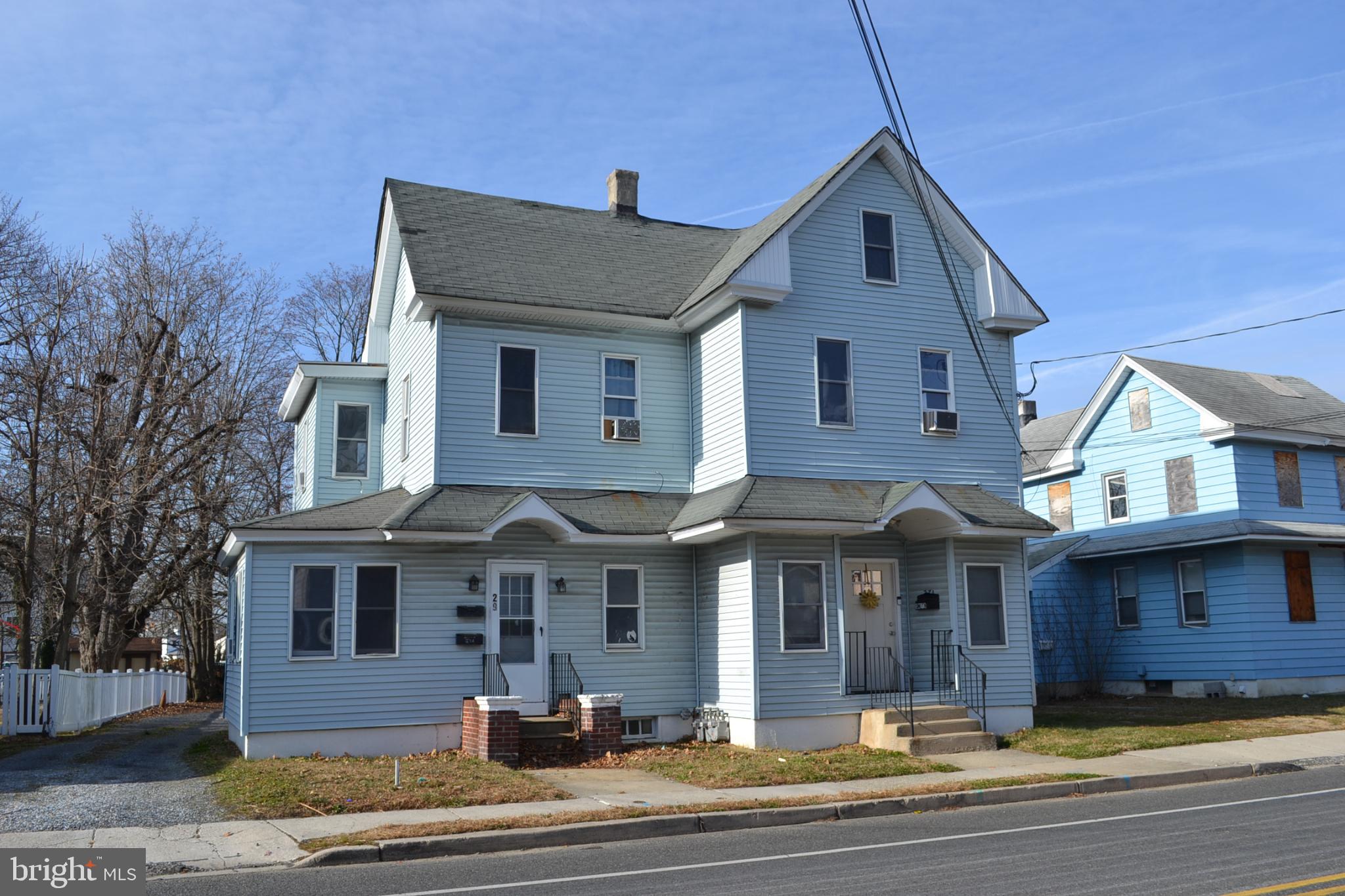 29 South Main Street Glassboro, NJ 08028 - Photo 4 of 38 Charming blue duplex with inviting porch.