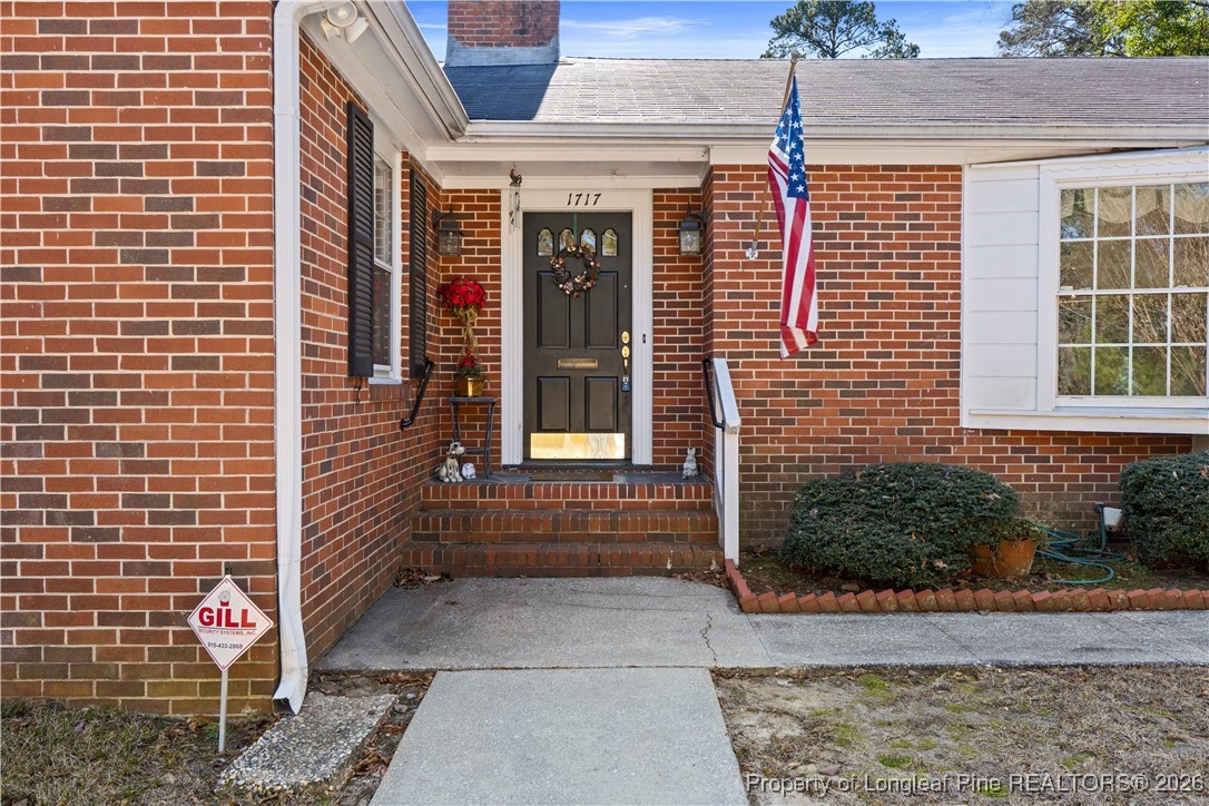 1717 Raeford Road Fayetteville, NC 28305 - Photo 2 of 25 a front view of a house