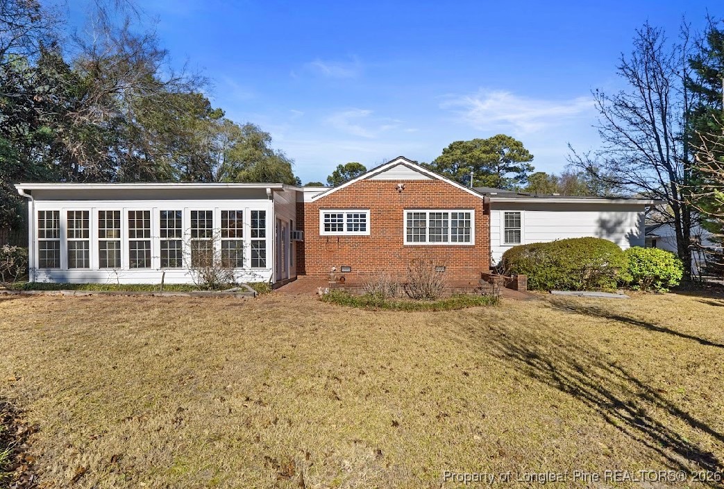 1717 Raeford Road Fayetteville, NC 28305 - Photo 24 of 25 front view of a house with a yard