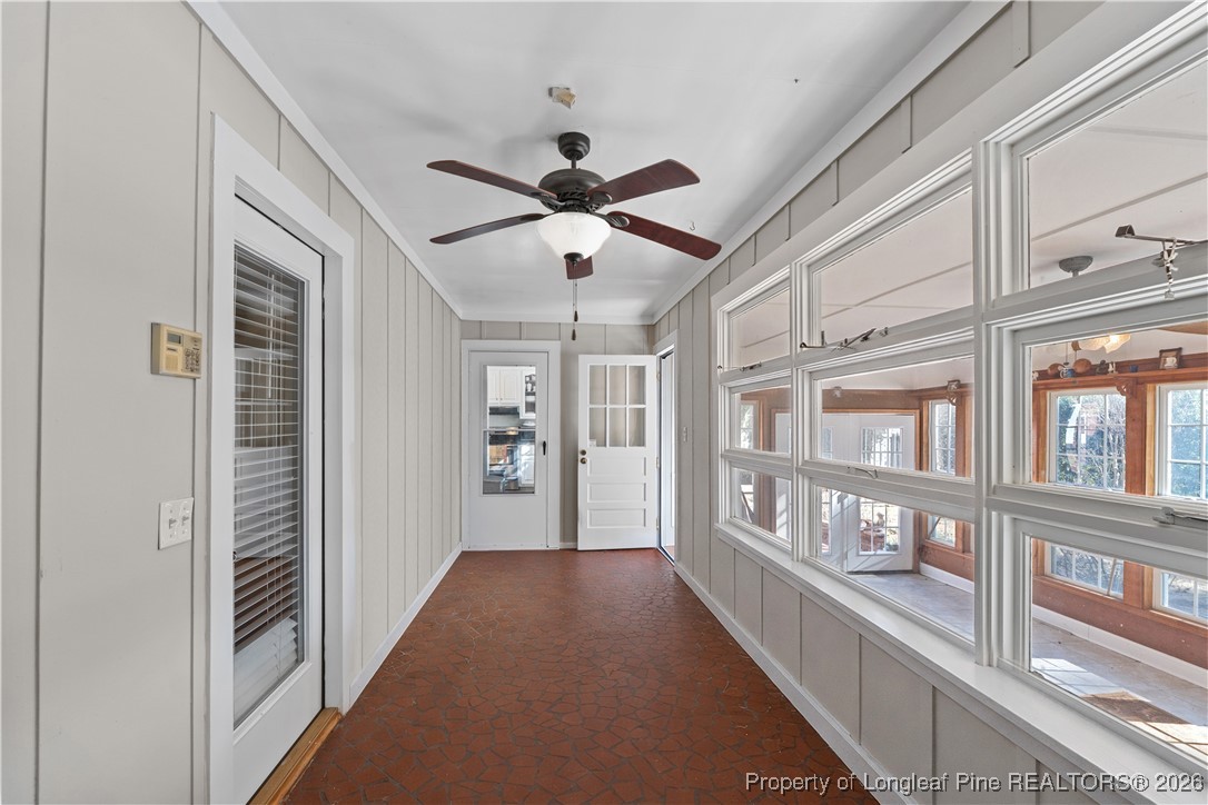 1717 Raeford Road Fayetteville, NC 28305 - Photo 4 of 25 a view of a hallway with windows