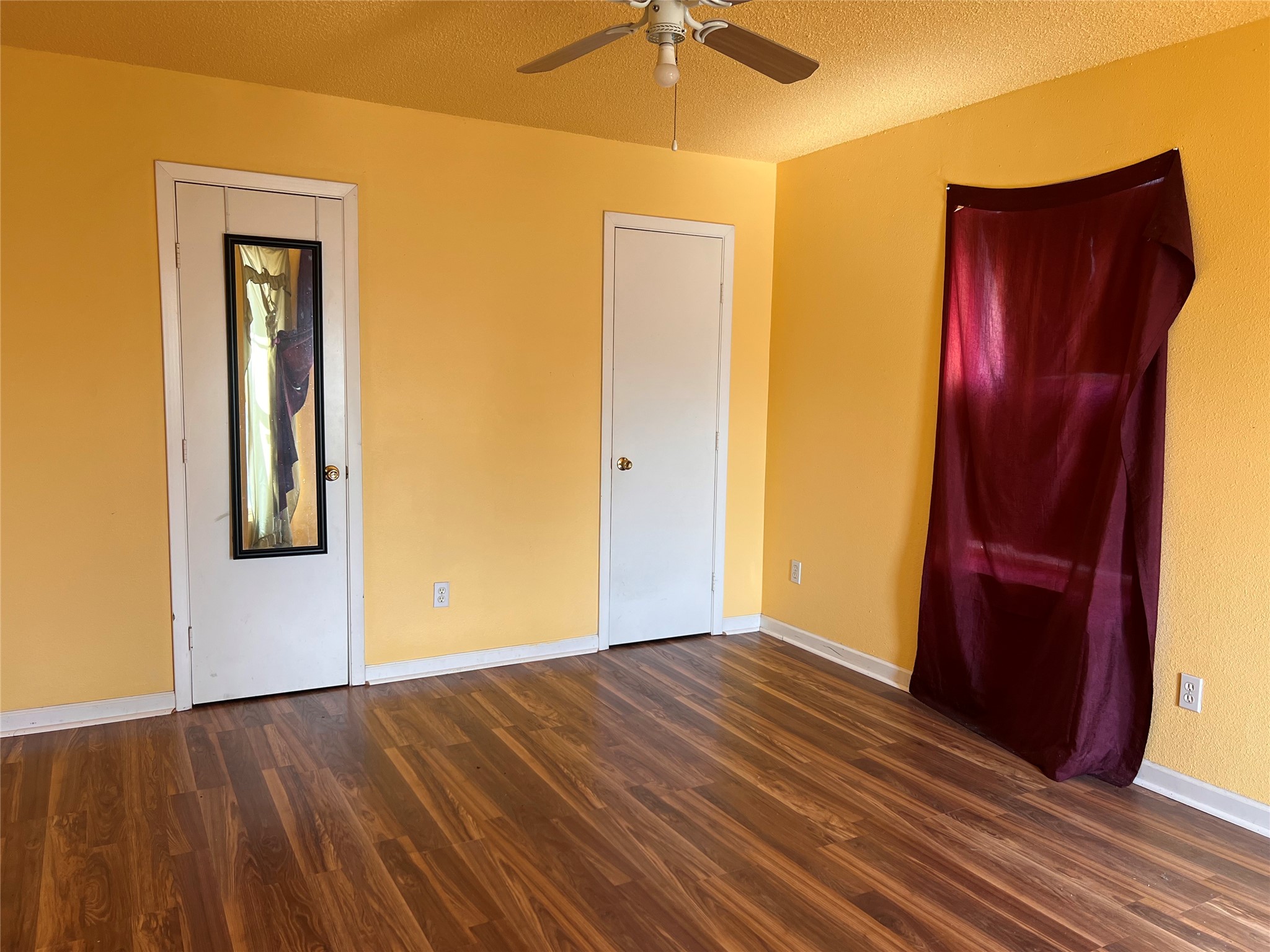 1305 Vista Road Pasadena, TX 77504 - Photo 14 of 29 a view of an empty room with a chandelier fan