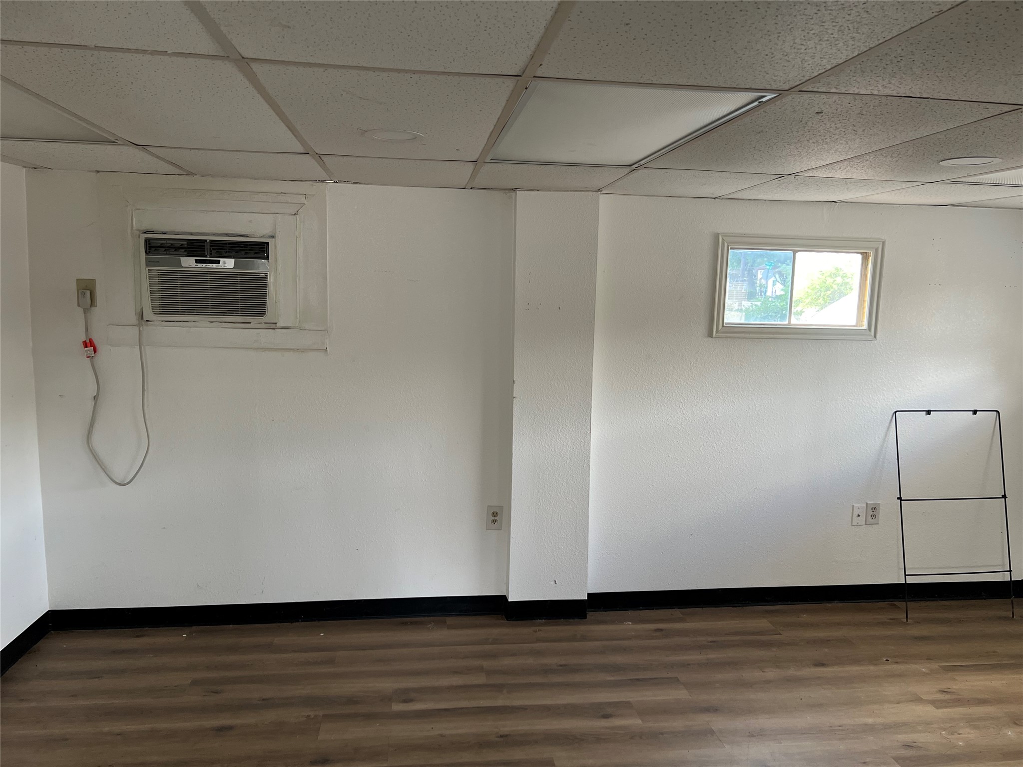 1305 Vista Road Pasadena, TX 77504 - Photo 20 of 29 a view of a room with wooden floor and white walls