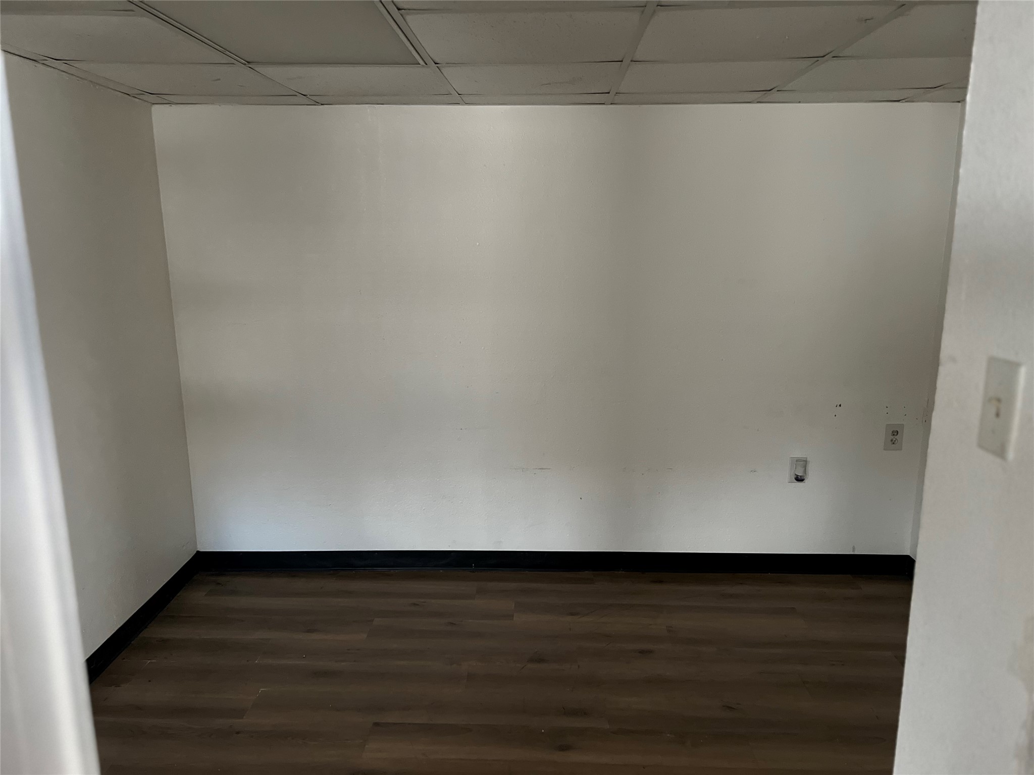 1305 Vista Road Pasadena, TX 77504 - Photo 22 of 29 a view of an empty room with wooden floor