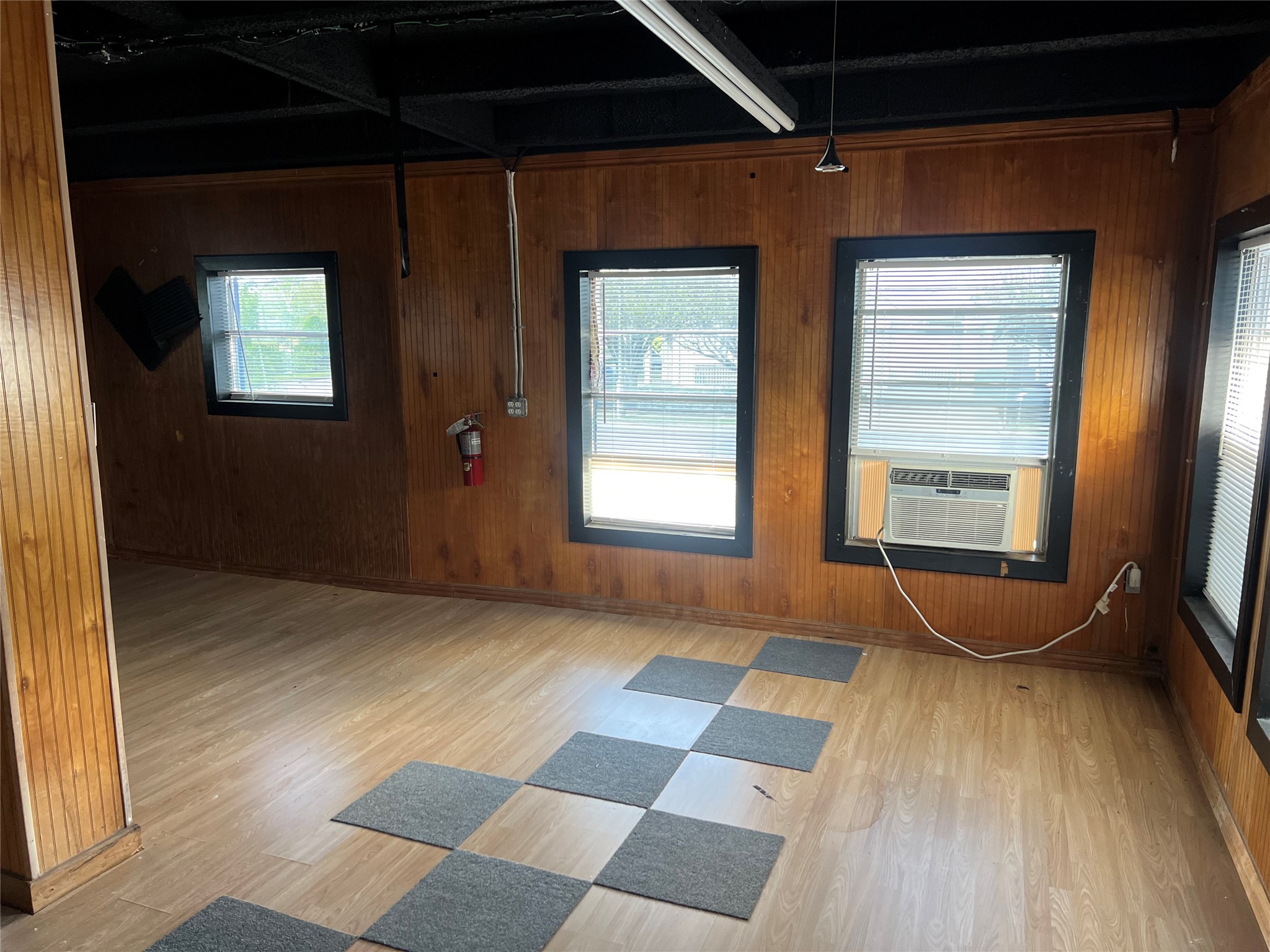 1305 Vista Road Pasadena, TX 77504 - Photo 27 of 29 a view of a room with wooden floor and windows