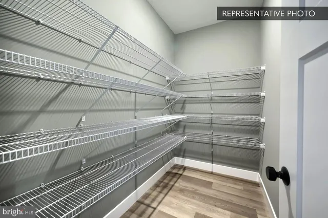 a view of a room with racks on the wall