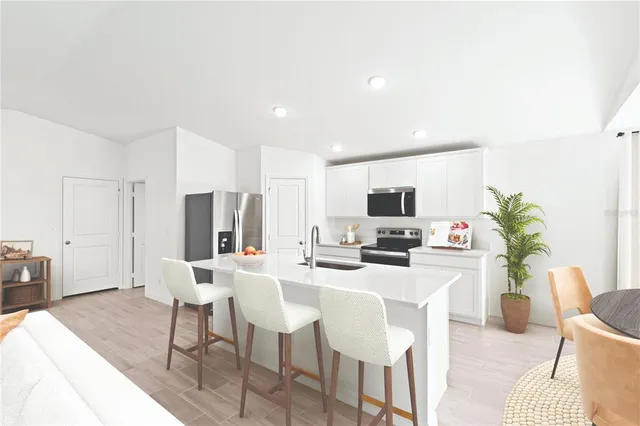 a view of a dining room with furniture