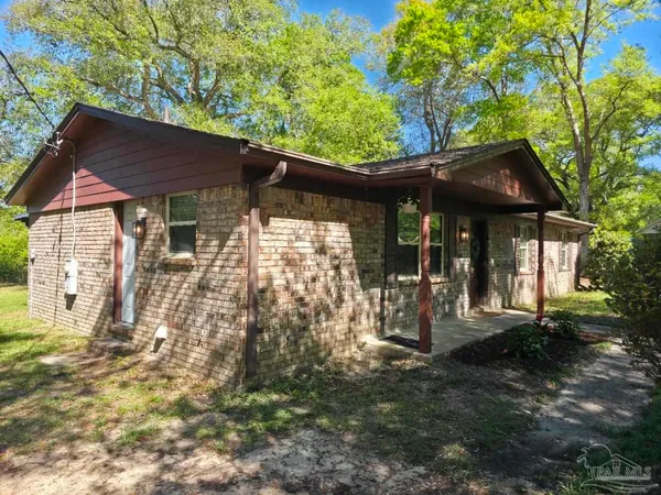 a front view of a house with a porch