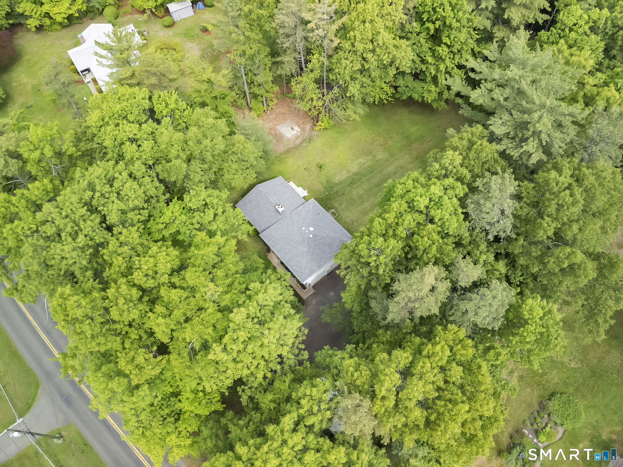 158 Notch Road Granby, CT 06035 - Photo 38 of 40 a view of a garden with a lake