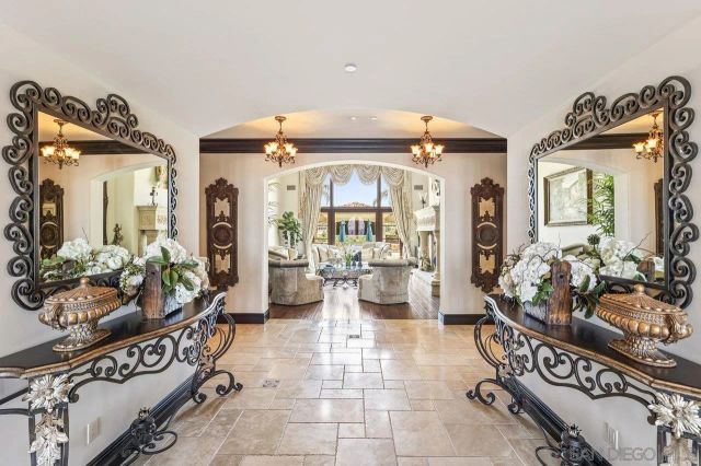 a view of a dining room and chandelier