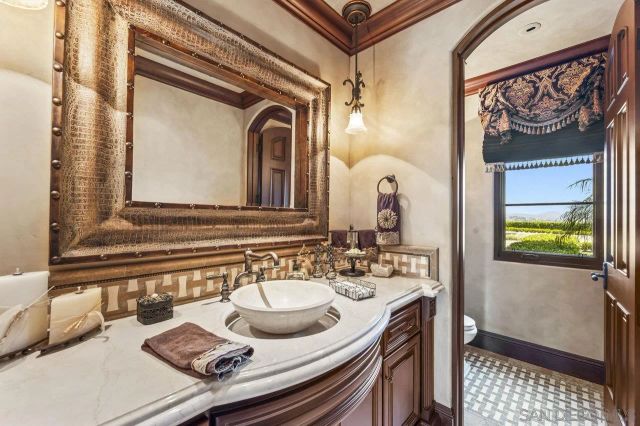 a spacious bathroom with a tub and shower