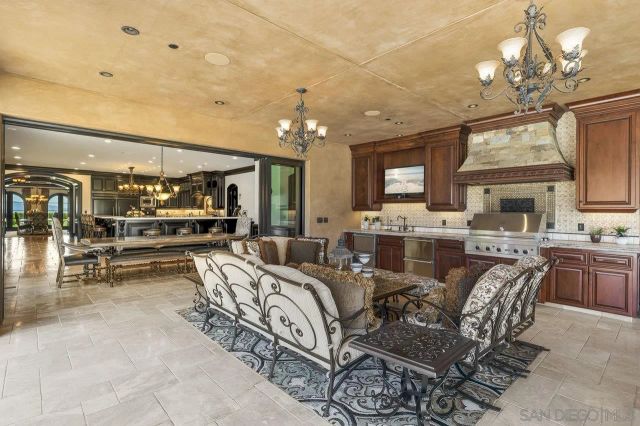 a bedroom with a bed next to a window with the outer view