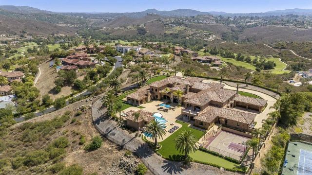 an aerial view of residential house with outdoor space
