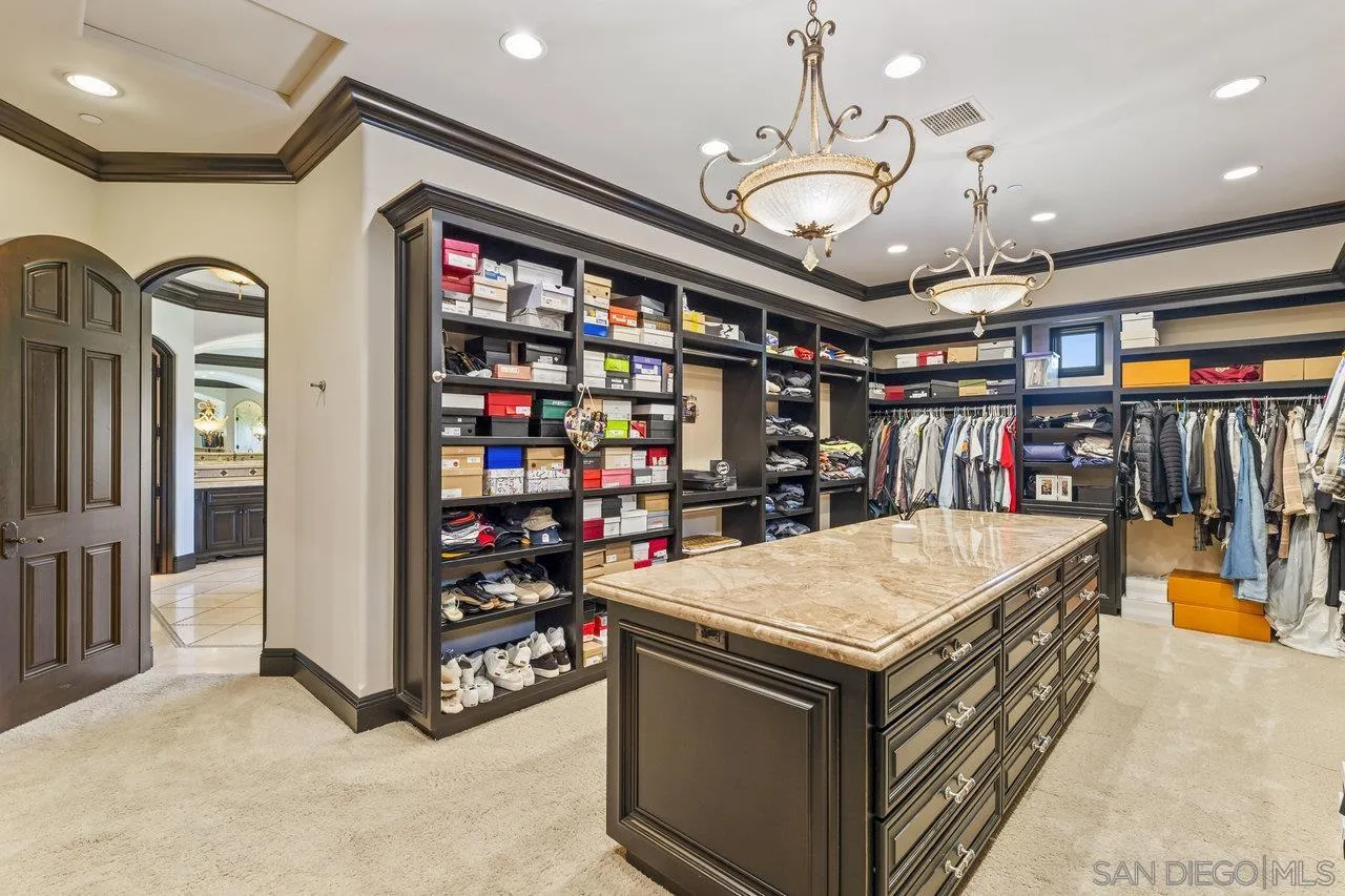14170 Bryce Point Poway, CA 92064 - Photo 39 of 67 a open kitchen with stainless steel appliances granite countertop a stove and a refrigerator
