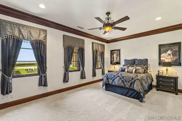 a view of a livingroom with furniture and windows