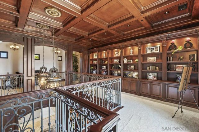 a view of a house with swimming pool and a yard