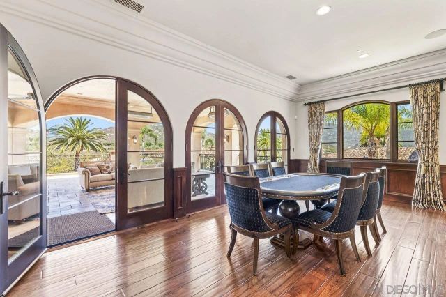 a view of a swimming pool and mountains