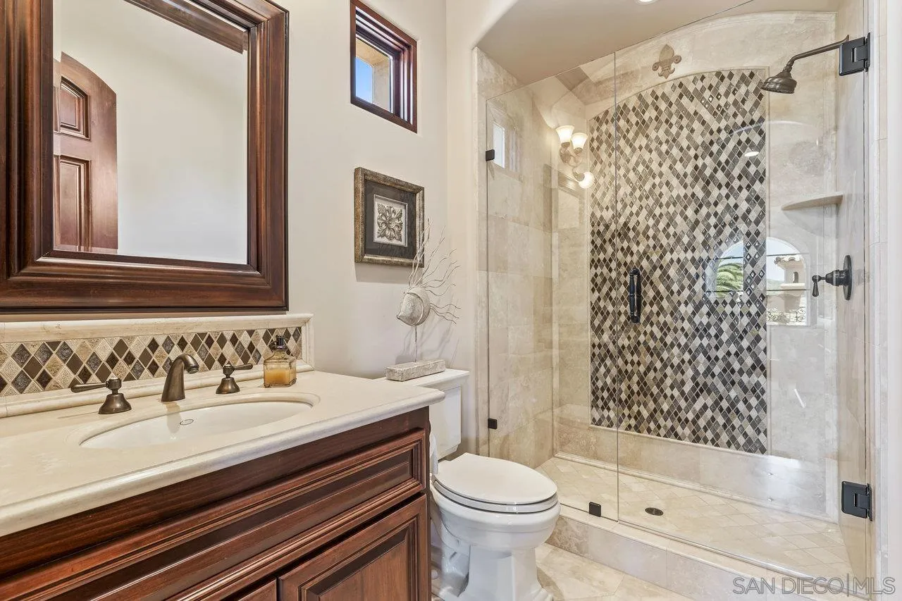 14170 Bryce Point Poway, CA 92064 - Photo 55 of 67 a bathroom with a sink a toilet and shower