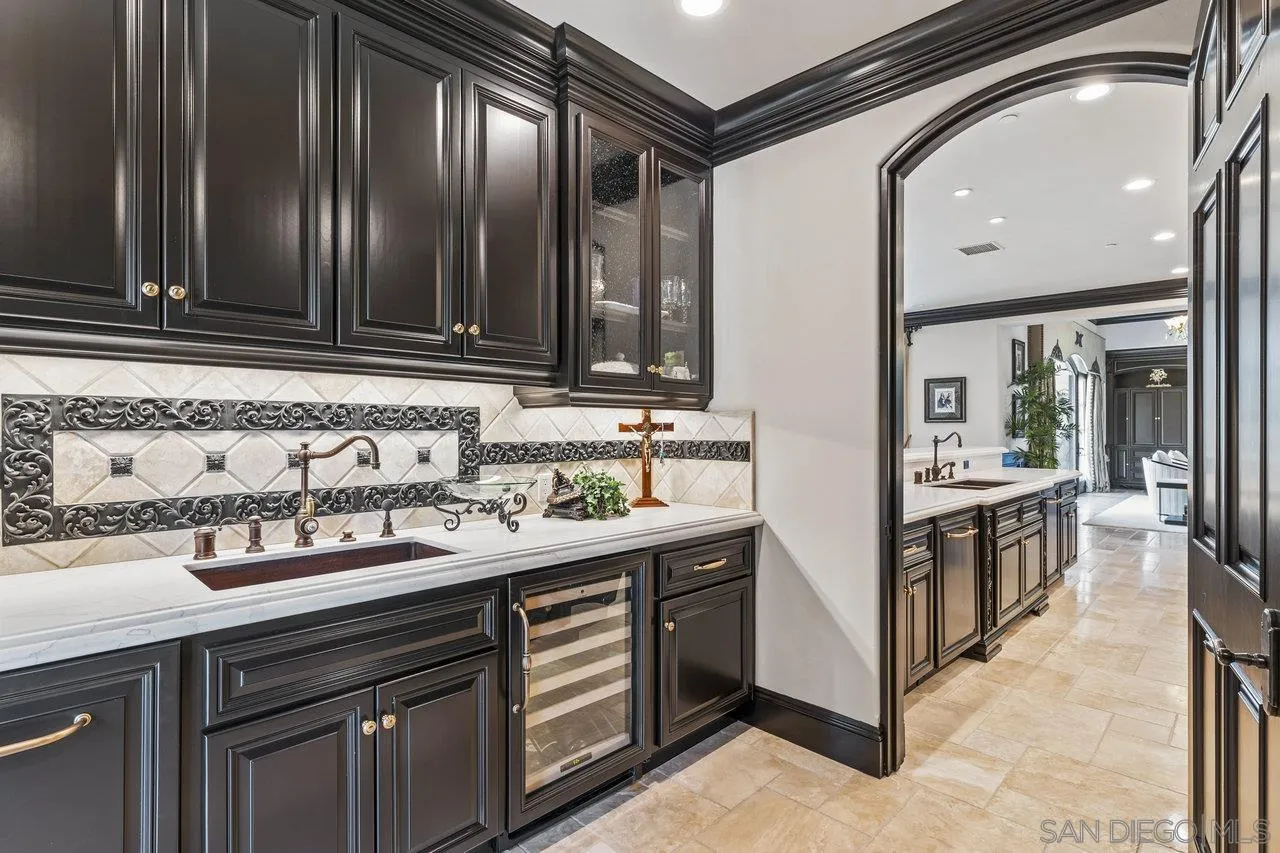 14170 Bryce Point Poway, CA 92064 - Photo 57 of 67 a kitchen with stainless steel appliances granite countertop a sink and cabinets
