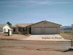 4025 Gold Springs Road Lake Havasu City, AZ 86406 - Photo 1 of 1 a white bed in a white house