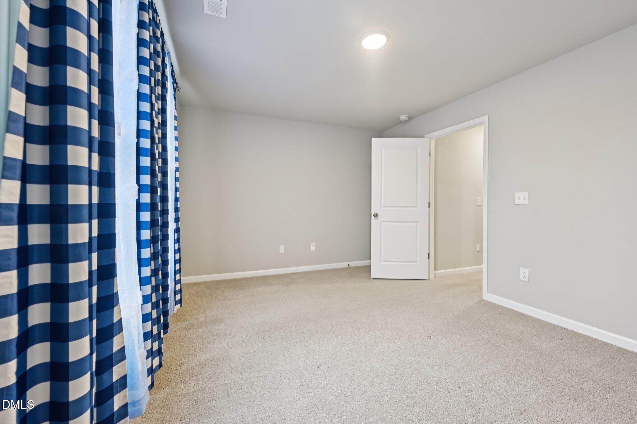 391 Byrdtown Road Benson, NC 27504 - Photo 21 of 28 a view of an empty room