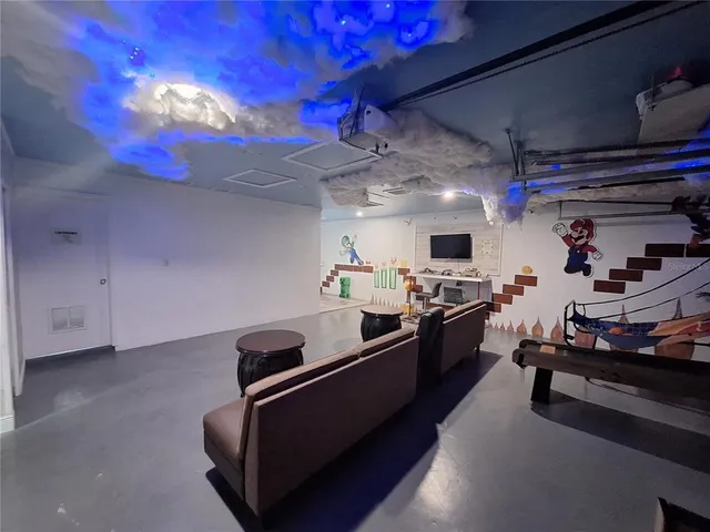 a kitchen with stainless steel appliances granite countertop a stove and a refrigerator