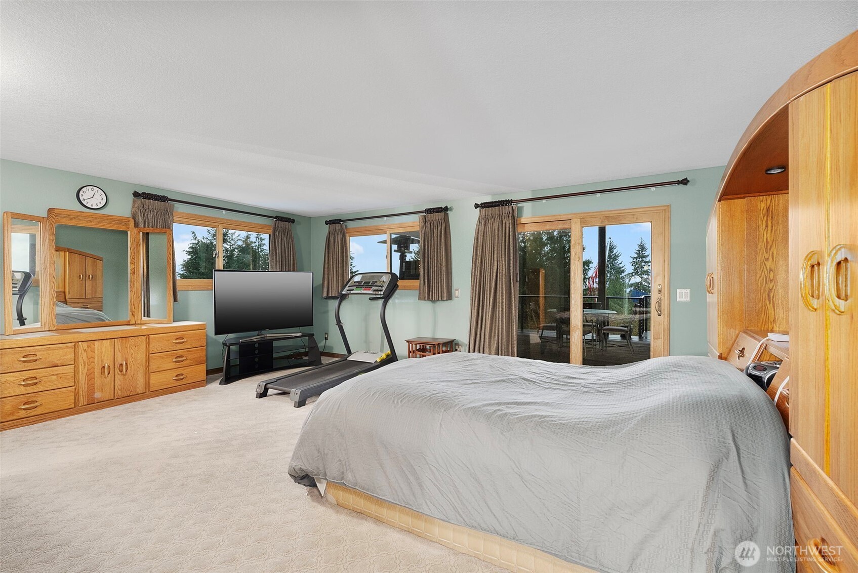 3321 Cooks Hill Road Centralia, WA 98531 - Photo 17 of 37 a bedroom with a bed a flat screen tv and dresser