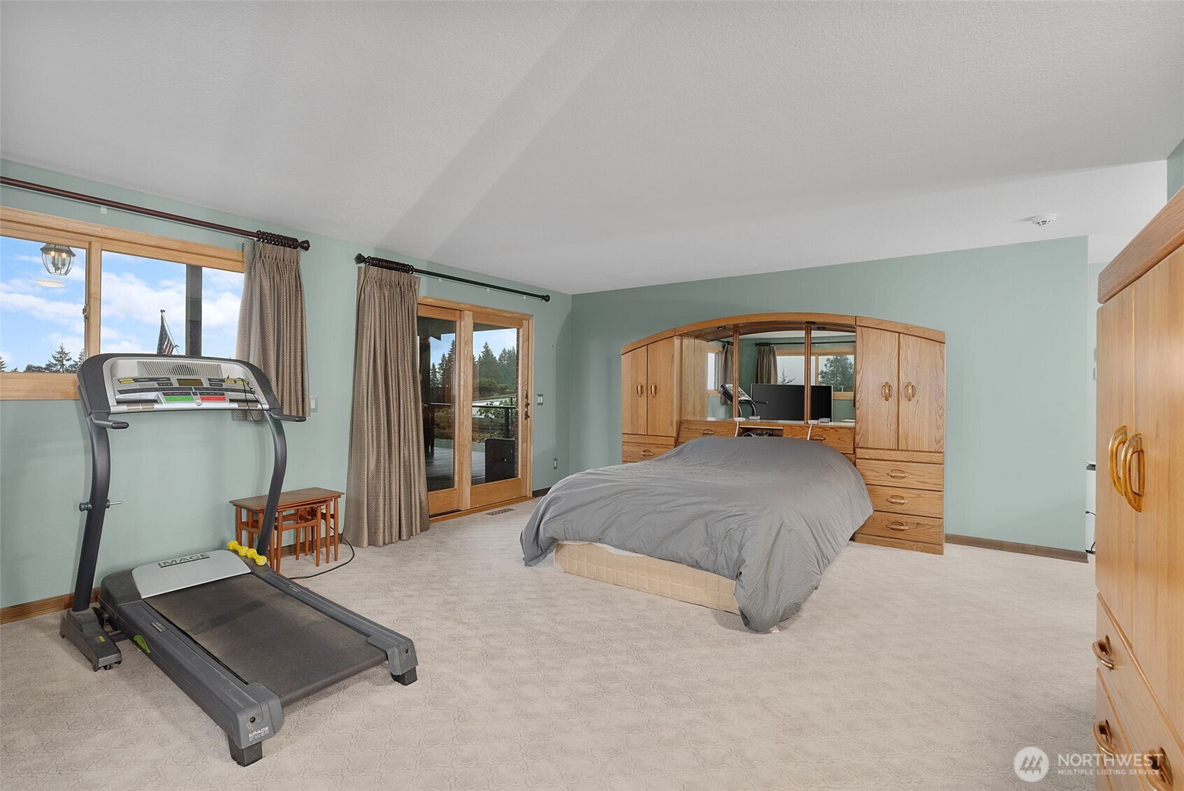 3321 Cooks Hill Road Centralia, WA 98531 - Photo 18 of 37 a bedroom with a bed and large mirror