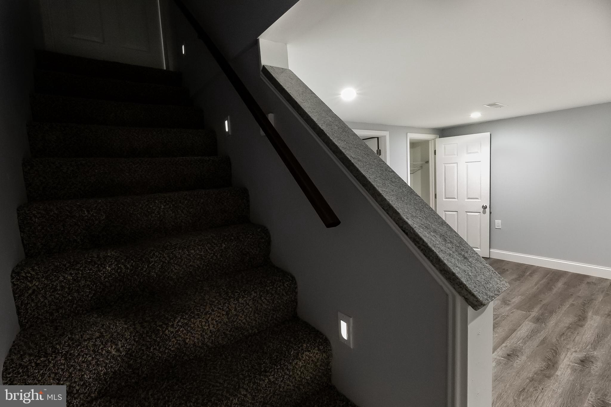 1950 Stanhope Road Baltimore, MD 21222 - Photo 31 of 45 STAIRS TO FAM RM w/LIGHT SENSING AUTO STAIR LIGHTS
